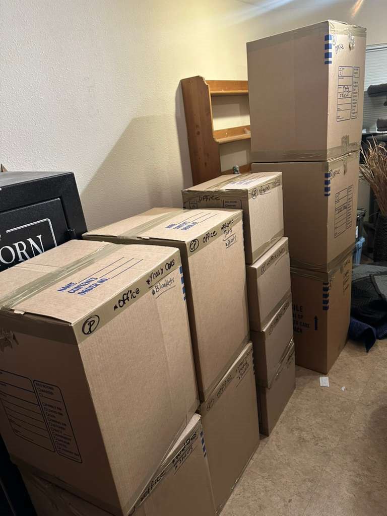 Stacked moving boxes ready for loading